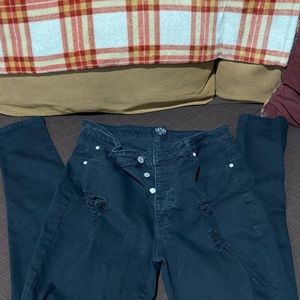 Black distressed skinny jeans